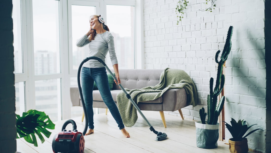 Cleaning upholstery with a vacuum